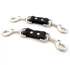 Leather Quick Clips for securing restraints.